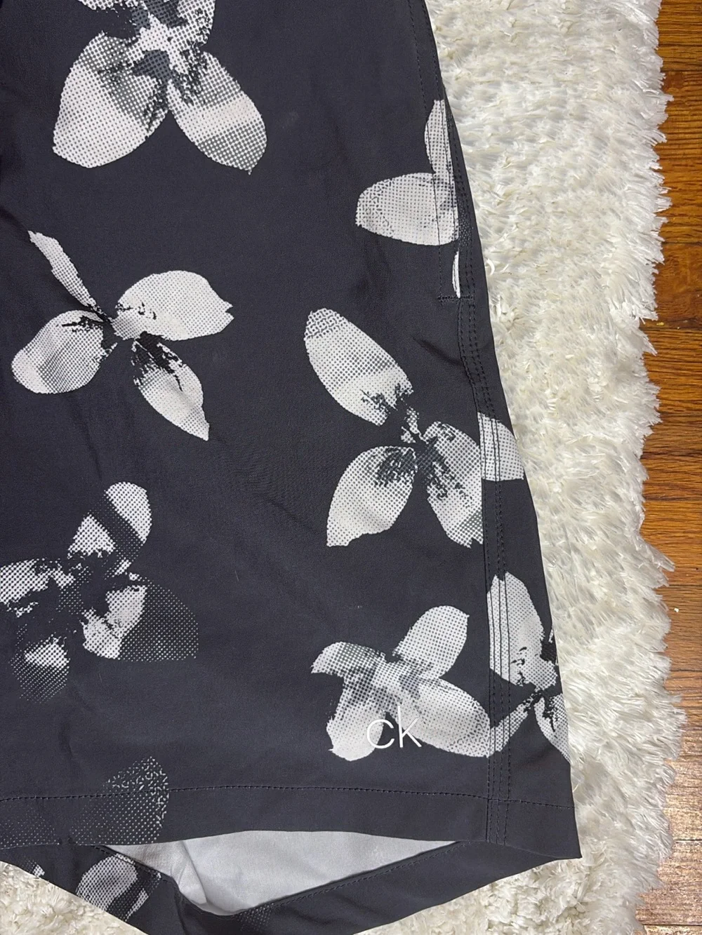 Calvin Klein Black Swim Shorts with White Floral Print